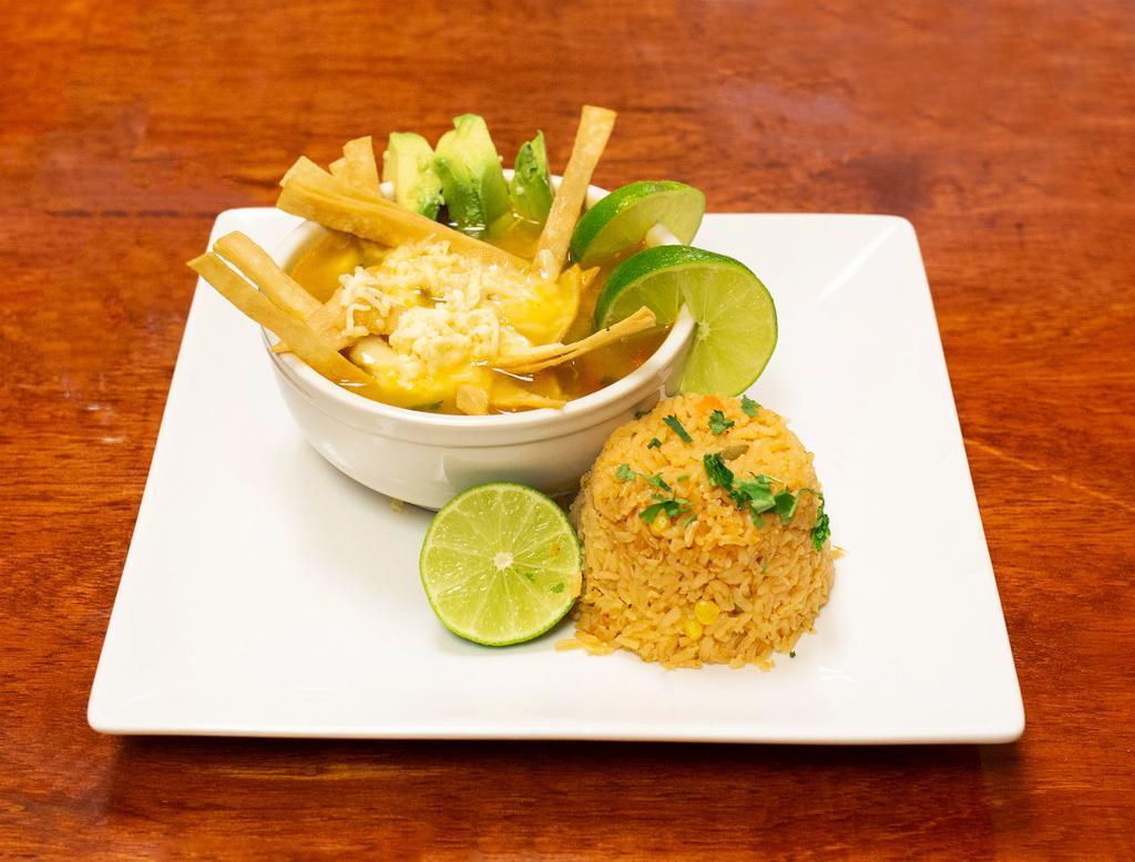 Sopa de Tortilla · With pieces of tender chicken, tortilla strips, onions, cilantro, tomatoes, cheese and rice.