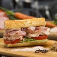 Ham and Turkey Sandwich · Black Forest Ham and Gourmet Turkey Breast Combination, served on our freshly baked sourdoug...