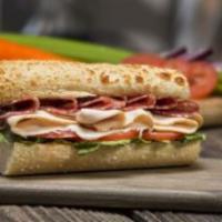 Turkey and Dry Salami Sandwich · Gourmet Turkey Breast, and Italian Dry Salami served on our freshly baked sourdough bread.