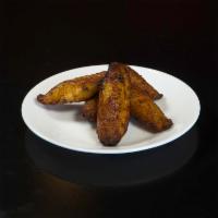 Fried Plantains · Platano frito.