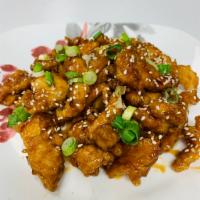 Sesame Chicken  · Tempura Chicken topped with sweet teriyaki sauce, sesame seeds  and scallions. 