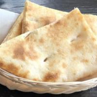 Naan · Single Serving of house fresh baked bread 
