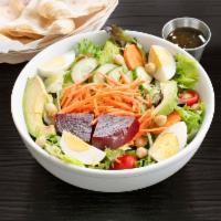 Chopped Salad · Mixture of field greens and baby kale tossed with avocado, tomatoes, potatoes, seasonal vege...