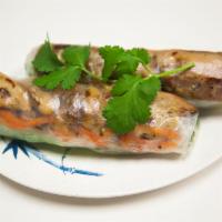 A6. Grilled Chicken Spring Rolls · Rice paper or crispy dough filled with shredded vegetables.