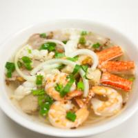 P14. Seafood Pho · Combination of shrimp, squid, imitation crab, and fish balls.