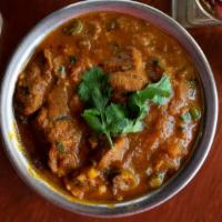 Shrimp Curry · Traditional dish of India carefully seasoned with an exotic blend of curry spices, onion, ga...
