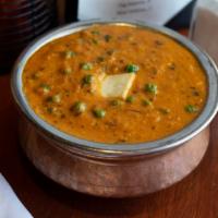 Mutter Paneer · Green peas with homemade cheese in mild gravy.