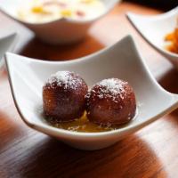 Gulab Jamun · A classical Indian dessert made of milk balls in sweet warm syrup.