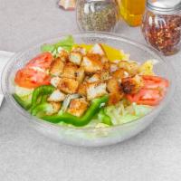 Caesar Salad · Iceberg lettuce, tomatoes, onions, Parmesan cheese and homemade croutons.