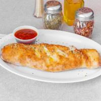 Deluxe Stromboli · Mozzarella cheese, pepperoni, sausage, bell peppers, onions and mushrooms.