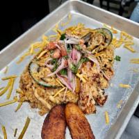 Junkanoo Seafood Rice (Paella) · Think of it as risotto meets paella...A hearty flavorful combination of various fresh seafoo...