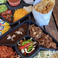 Fiesta Street Taco Tray · Serves 4-5 and includes Slow cooked Brisket, Beef Picadillo, Pork Carnitas, Chicken Fajita, ...