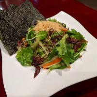 Salmon Skin Salad · Salmon skin, masago & organic mixed green with vinegrette