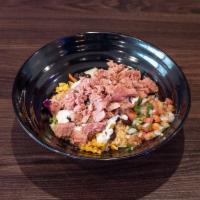 Carnitas Bowl · Carnitas bowl with the toppings of your choice, rice, beans, lettuce, corn,  pico de gallo ,...
