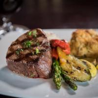 Hand Cut Filet Mignon · 7 oz. choice Braveheart black Angus beef. Topped with seasoned butter. Gluten-free.