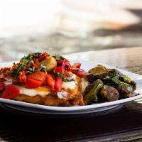Roman Parmesan Crusted Chicken · Pan fried, panko, and cheese crusted. Topped with an Italian salsa and melted mozzarella. Ro...