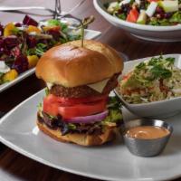 The Beyond Burger · Plant-based veggie burger, american cheese, greens, tomato, red onion, house made sauce, and...