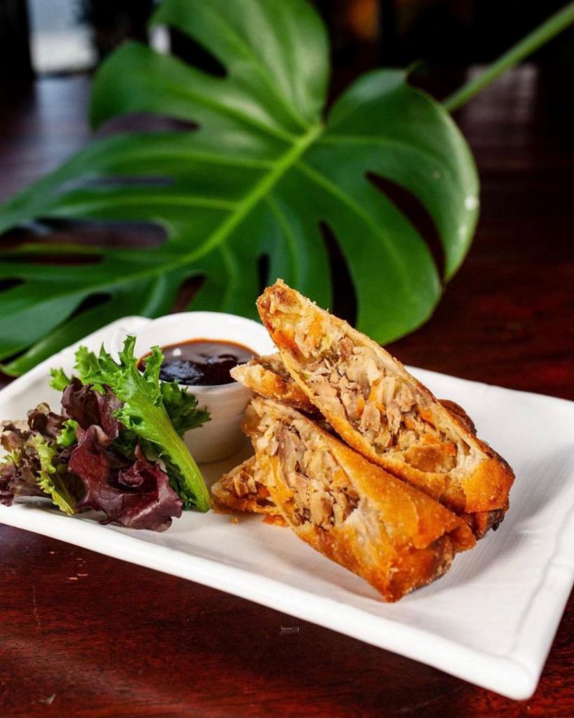 JERK CHICKEN EGG ROLLS · our best seller , served  with jerk dipping sauce