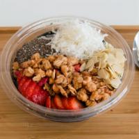 Detox Tropic Smoothie Bowl · Banana, strawberry, mango and charcoal powder. Topped with granola, chia, sliced almonds and...
