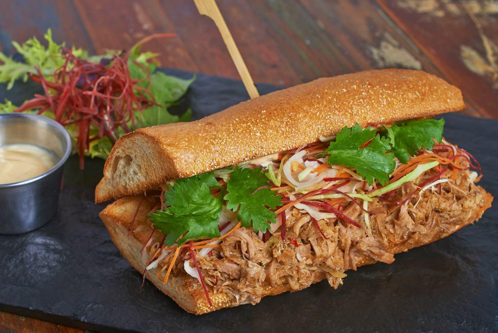 Myanmar Pulled Pork Bánh mì · Sandwich. Made with peanut crunchy slaw.