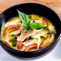 Green Curry · With coconut milk, bamboo shoots, bell peppers, green peas and basils.