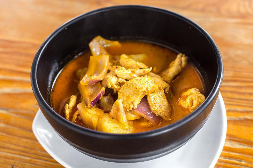 Yellow Curry · Comes with coconut milk, potatoes and red onions.