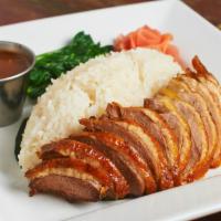 Roasted Duck (Over rice) · Served with honey dark soy sauce and baby Chinese broccoli and clear soup.