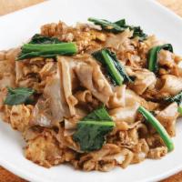 Pad Sea Eiw · Flat rice noodles sauteed with egg, Chinese broccoli and black soy sauce.