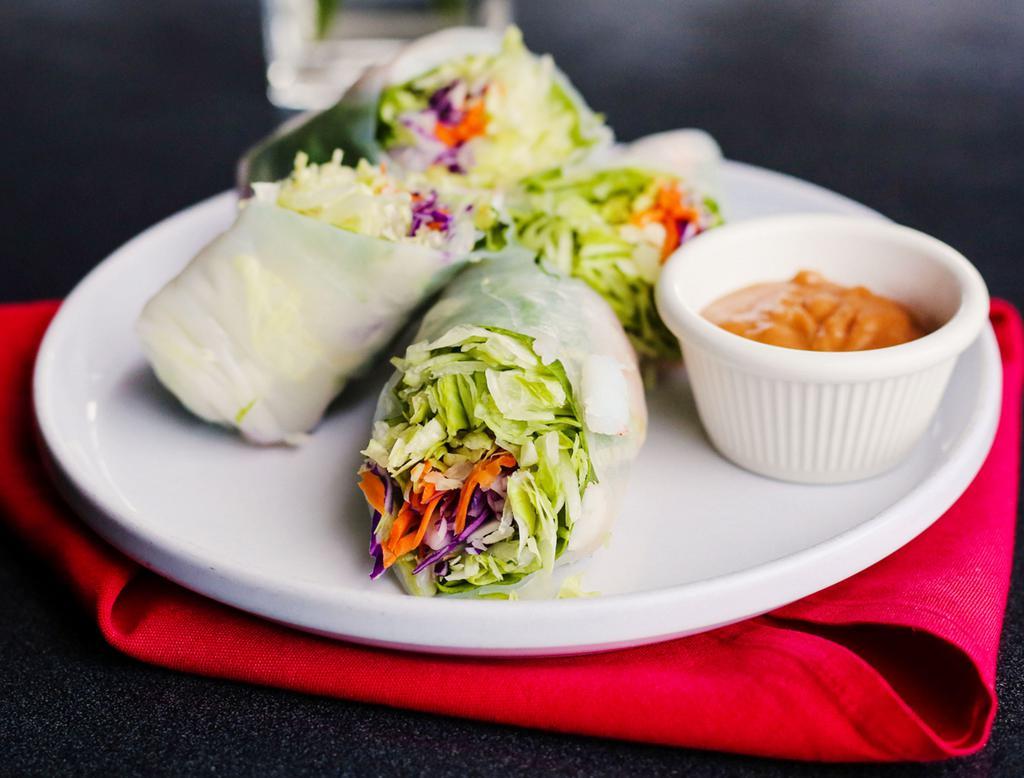 A1. Salad Rolls · Lettuce, carrots, purple cabbage and tofu or shrimp wrapped in rice paper served with homemade peanut sauce.