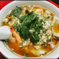 N5.   Tom Yum Noodles Soup · Thin rice noodle soup with bean sprouts, ground chicken, shrimp and squid in a clear broth, ...