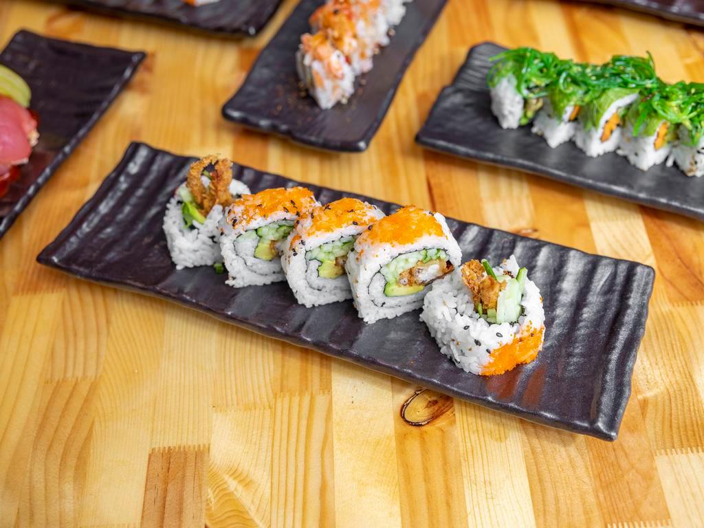 Spider Roll · Raw. Deep-fried soft shell crab, avocado, cucumber, and masago.