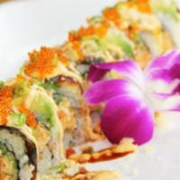 Yellow Roll · Raw. Daikon sprouts, cucumbers, and avocado on the inside topped with yellowtail and thinly ...