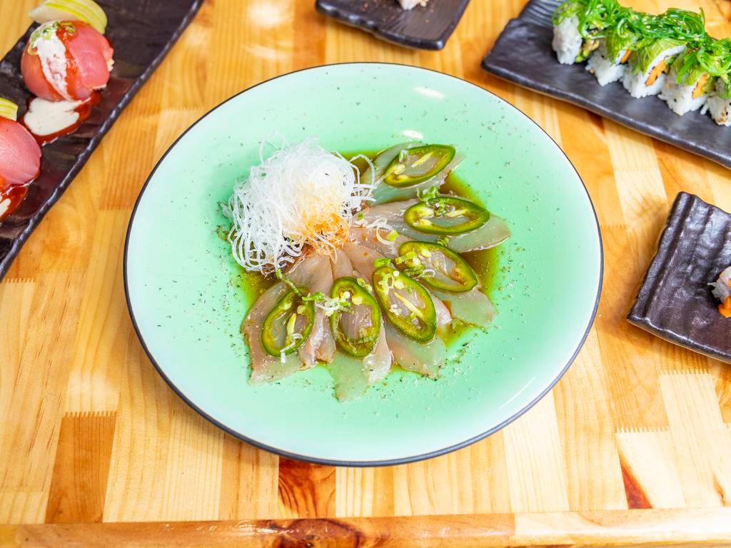 Pepper Fin · Raw. Thinly sliced albacore and jalapenos served with chili oil and ponzu sauce.
