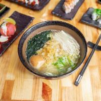 Yuzu Shio Ramen · Enoki, menma, seaweed, tempura crunches, sprouts, green onions and an egg.