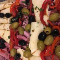 Cold Antipasto - Served with Bread  - Served with Garlic Knots · Ham, salami, provolone, diced fresh tomatoes, mozzarella and mixed olives. Served with bread.