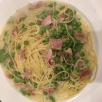 Spaghetti Carbonara - Large Order  · Pancetta, eggs, onions, peas, black pepper and Parmigiano Reggiano cheese. Pasta served with...
