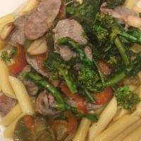 Penne Anna - Large Order · Penne pasta served with Sweet sausage, broccoli rape, red cherry peppers, garlic and oil. Pa...