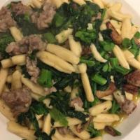 Cavatelli with Sweet & Spicy Sausage and Broccoli Rabe with garlic and extra virgin olive oil. Served with Bread. · Cavatelli with Sweet & Spicy Sausage and Broccoli Rabe with garlic and extra virgin olive oi...