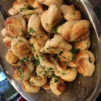 6 Garlic Knots - Served with Sauce · Marinated with fresh garlic and extra virgin olive oil.