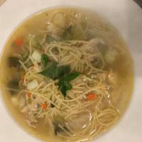 Chicken Noodle Soup - Large - Served with Bread · Fresh chicken, noodles, celery, onions, carrots and potatoes. Served with Bread.