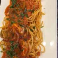 Shrimp Fra Diavolo · Jumbo shrimp baked with breadcrumbs, butter wine, lemon, garlic and olives oil. Served with ...