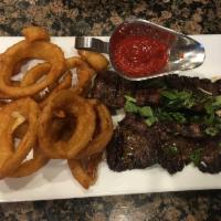 Skirt Steak Alla Vito · Grilled skirt steak served with onion rings.  Entrees served with bread, choice of pasta, sa...