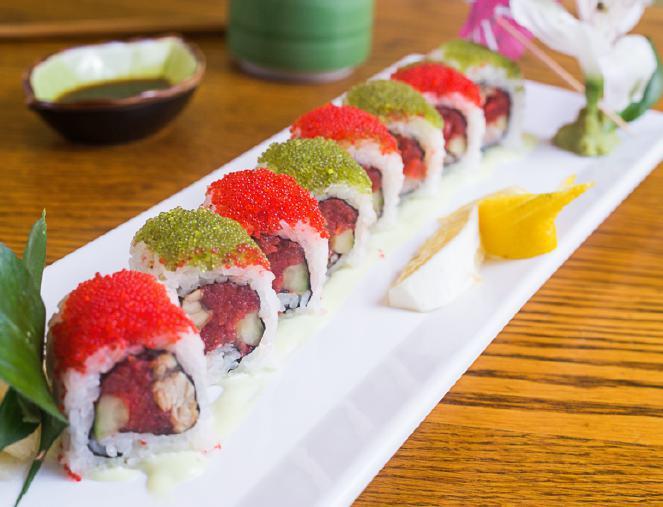 Wasabi Bomb Roll · Eel, spicy tuna, jalapeno. Top: red, black, wasabi tobiko with wasabi sauce. Spicy.