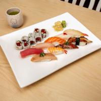 Sushi and Sashimi Regular Combo · 5 pieces sushi and 6 pieces sashimi with California roll or spicy tuna.