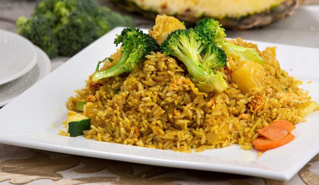 Pineapple Fried Rice · Fried rice with egg, mixed vegetables, pineapple, raisins and a touch of curry powder.