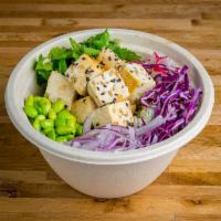 Tofu Teriyaki Bowl · Tofu teriyaki, radish, carrots, red onions, red cabbage, edamame, cilantro and white garlic ...
