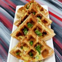 4 the Love of Bacon Savory Waffles · Bacon, egg, cheese topped with hollandaise sauce and green onions. 