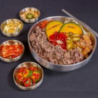 Ribeye Bulgogi Beef Bowl · Kimchi, sesame bean sprouts, soy braised potatoes, pickled serrano chili, sweet chili sauce,...