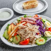 Chef's Salad · Turkey, Ham, on hard-boiled egg, Swiss and American cheese.