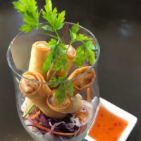 Deep Fried Spring Roll · Deep-fried wheat paper wrap stuffed with vegetables, taro and glass noodle served with plum ...